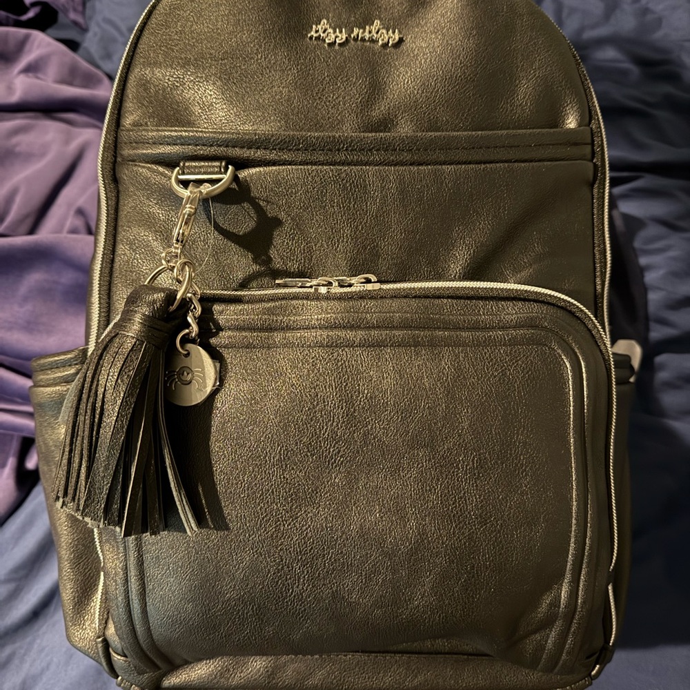 Itzy Ritzy Black Backpack with Tassel Charm